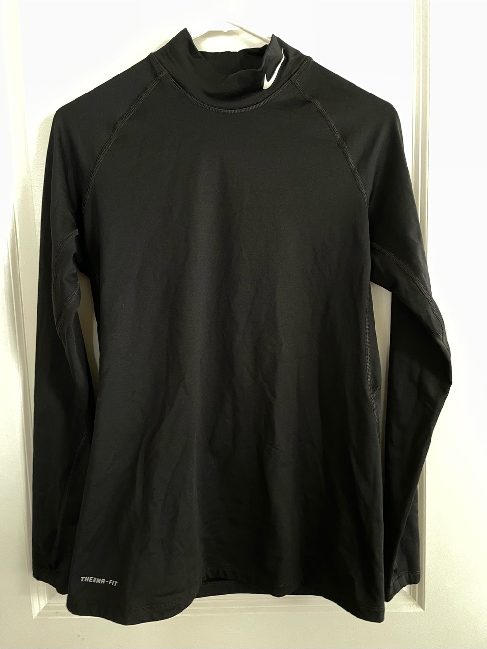 Nike women’s Black Long-Sleeve Therma-Fit Top